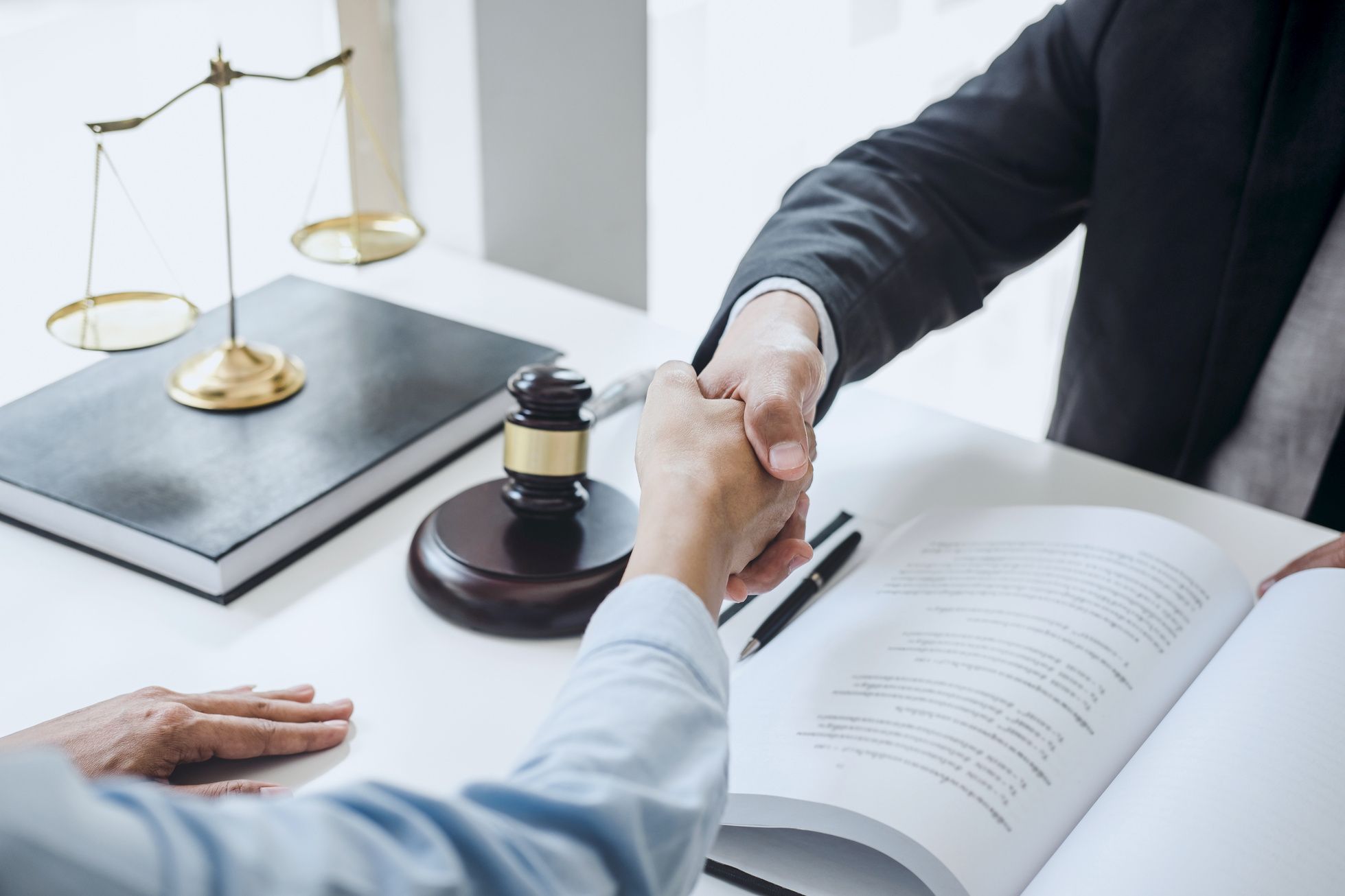 Lawyer Shaking Hands with Client